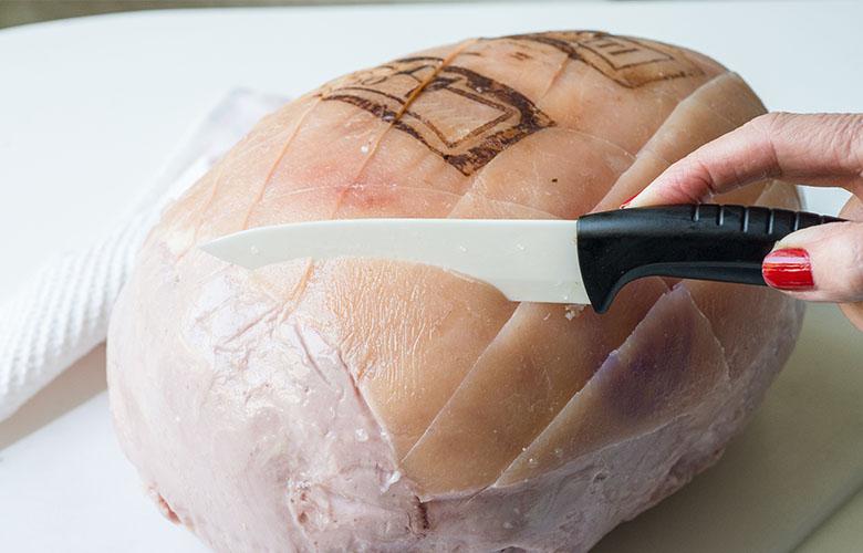 Slicing pre-cooked ham, photo by Gourmet Food Store