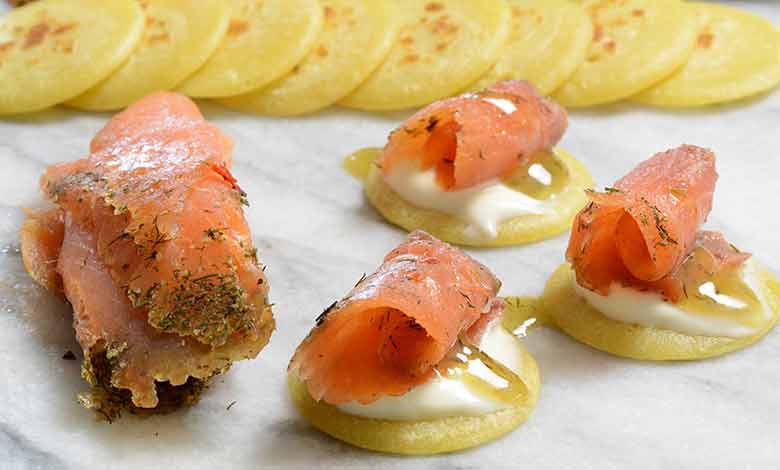 Delicious dill-coated gralvlax smoked salmon, photo by Gourmet Food Store