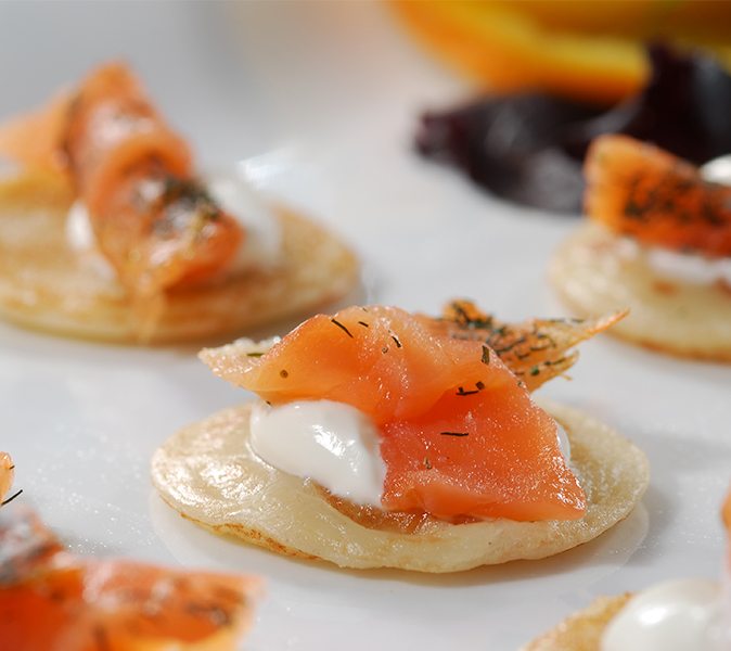 Example of Served smoked salmon on crackers, photo by Gourmet Food Store