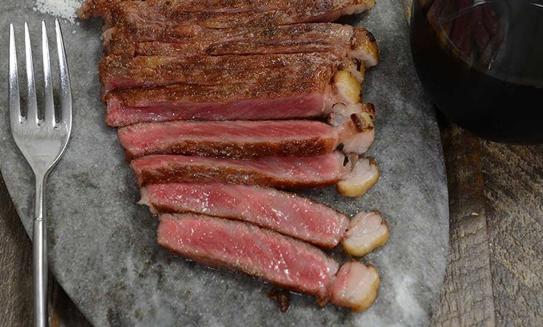 a delicious wagyu steak cut up on a plate, photo by Gourmet Food Store