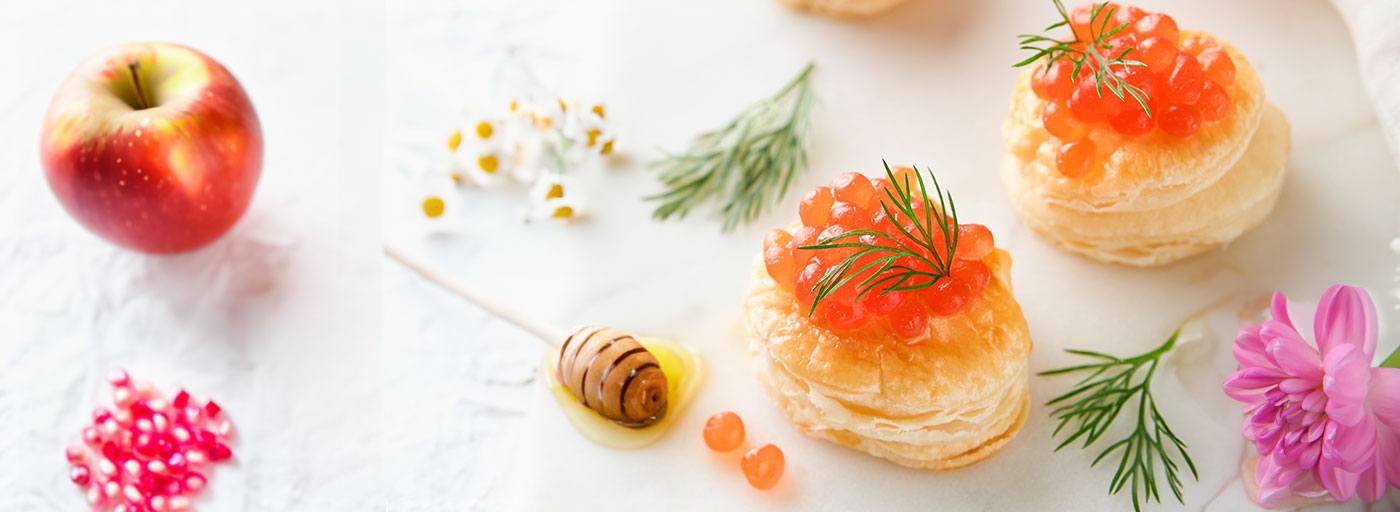 view of kosher red caviar with rosh hashanah concept, photo by Gourmet food Store